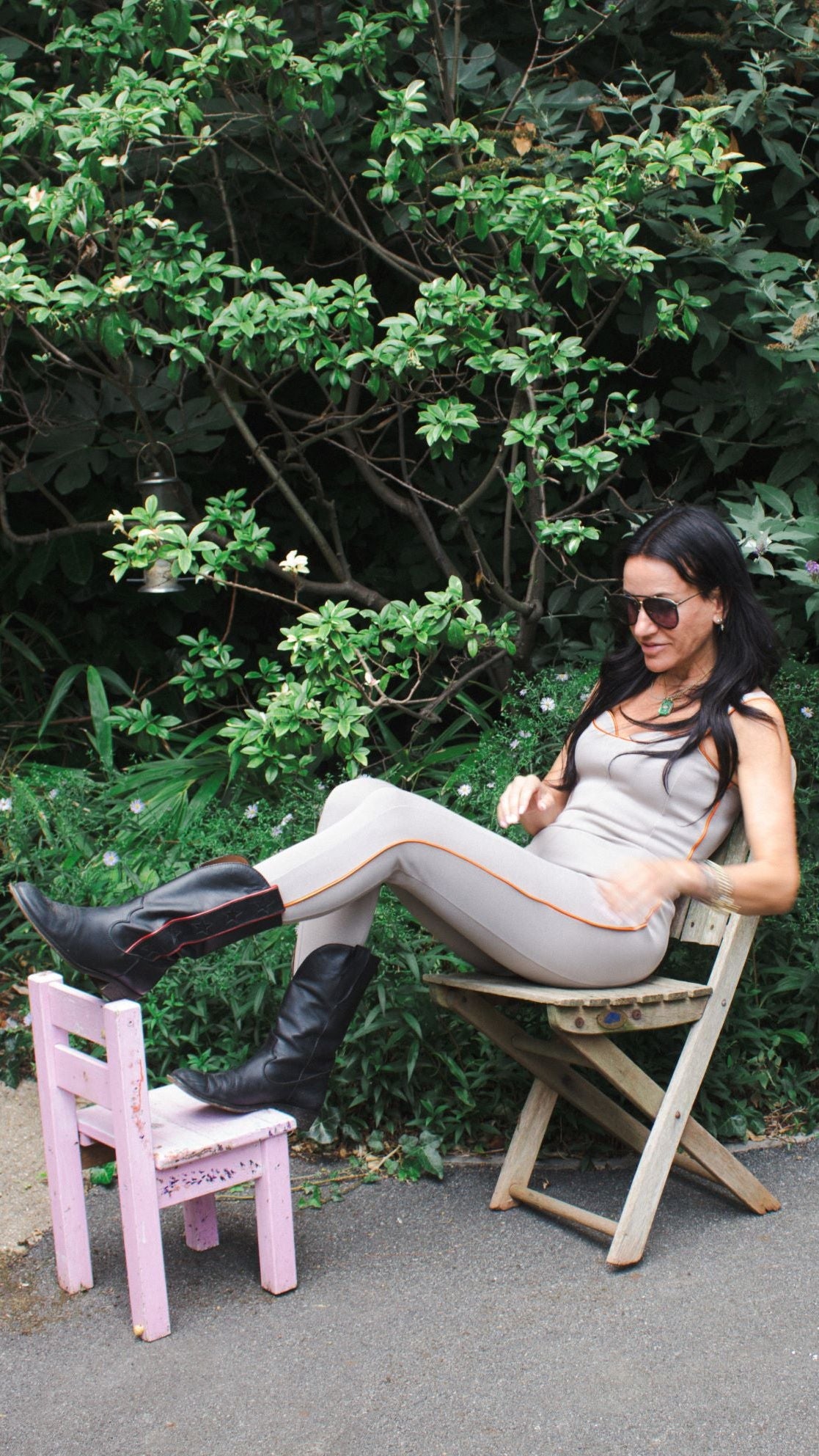 The bodysuit is versatile, worn for activewear, daywear, to a festival, concert. The piping trim adds a touch of colour and smartness to the suit.