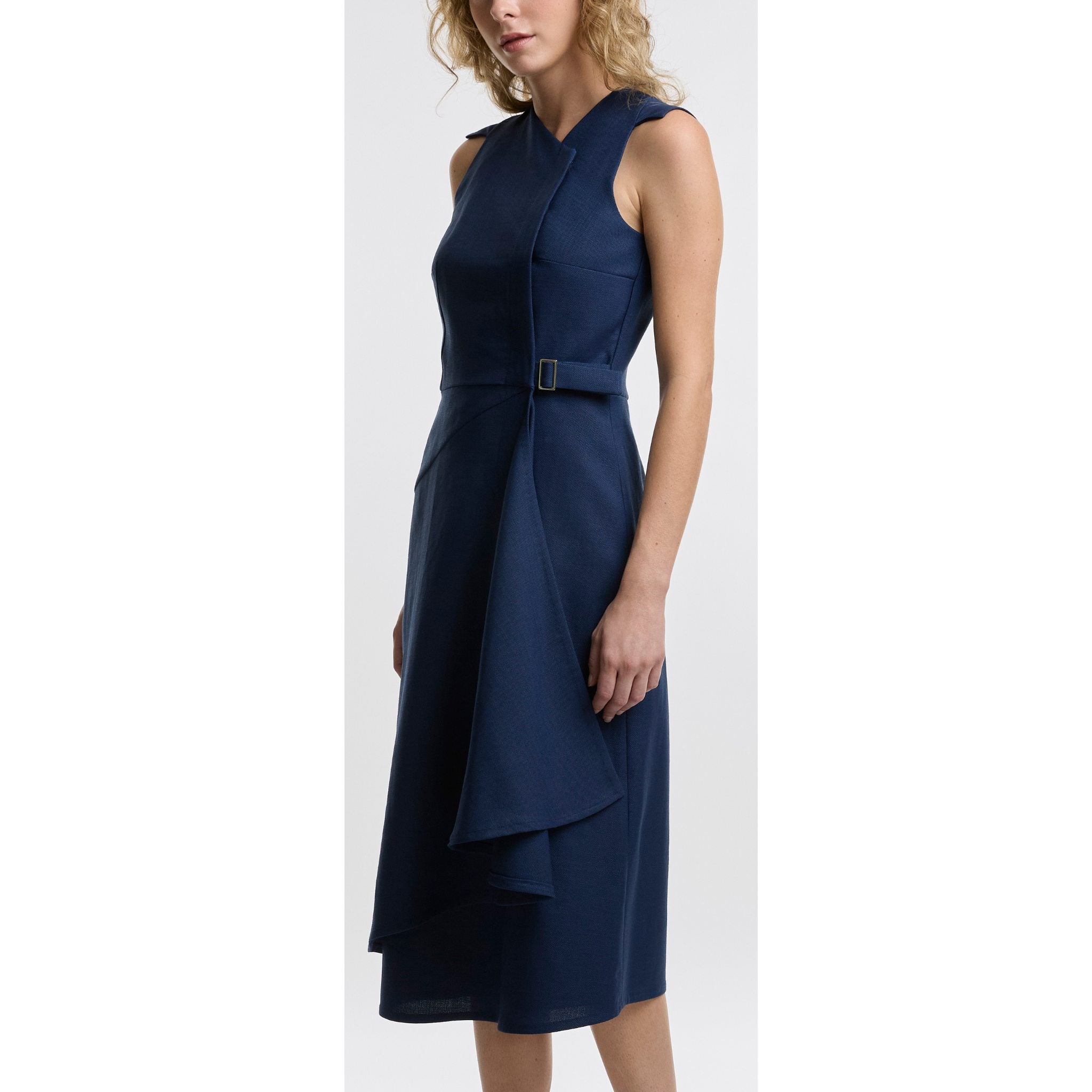 Navy blue dress with a buckle on a white background